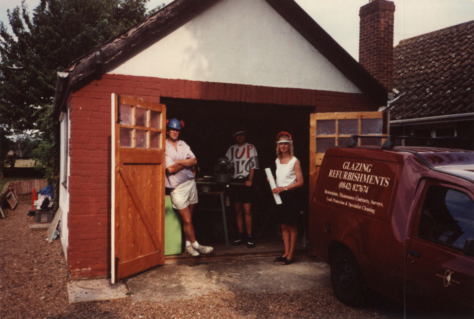 Workshop with doors open and van